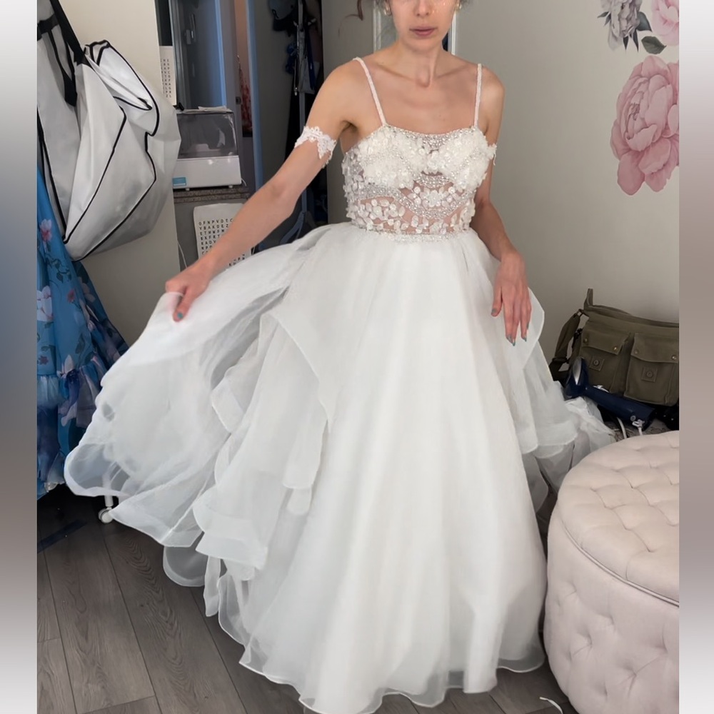 Wedding dress spaghetti strap, ruffled skirt, bustle at back, beaded bodice